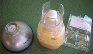 The Kinn Kudose pill concealer base, bottle with apple/chicken baby food in it, and pill casings that will disintegrate when your dog eats it.